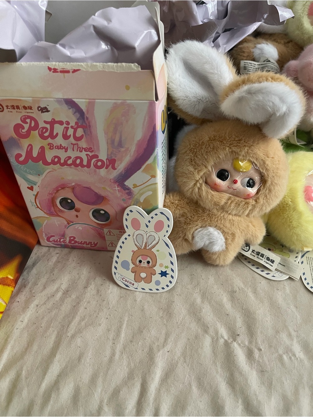 Baby three Petit Macaron Cocoa plush doll
